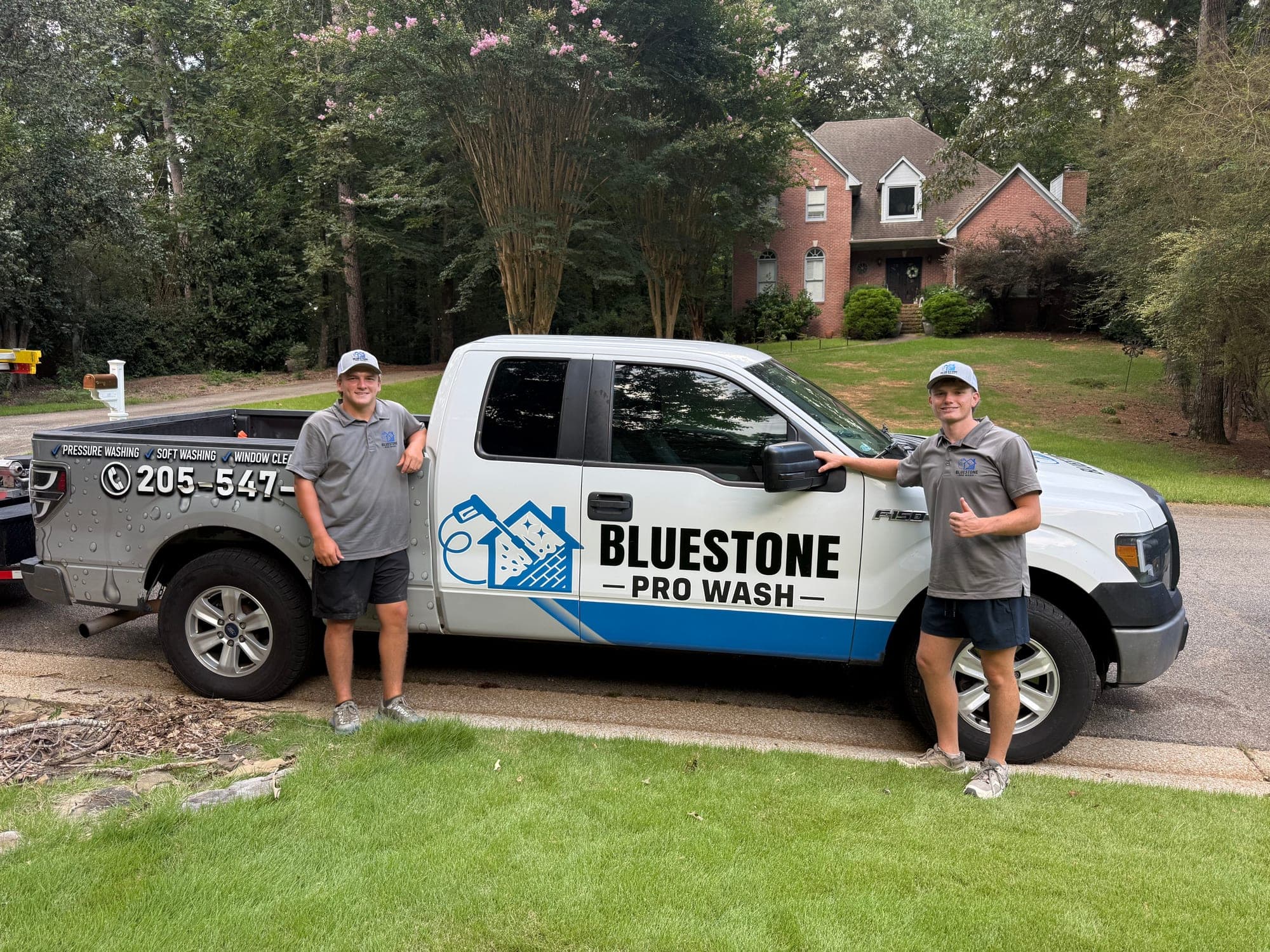 The Bluestone Pro Wash crew with the branded company truck at a home in Birmingham