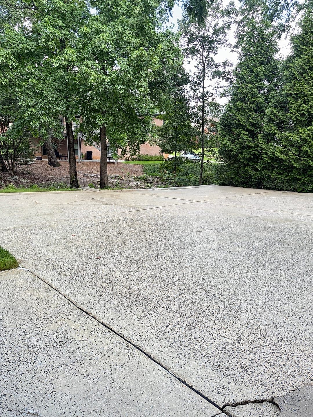 Clean concrete pad after pressure washing